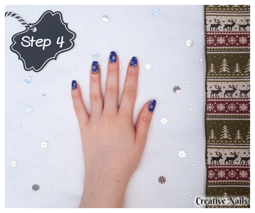 blue nails with snowflakes