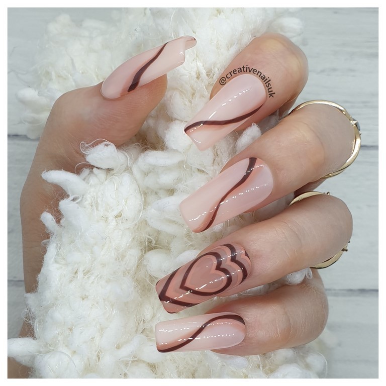 brown abstract false nails